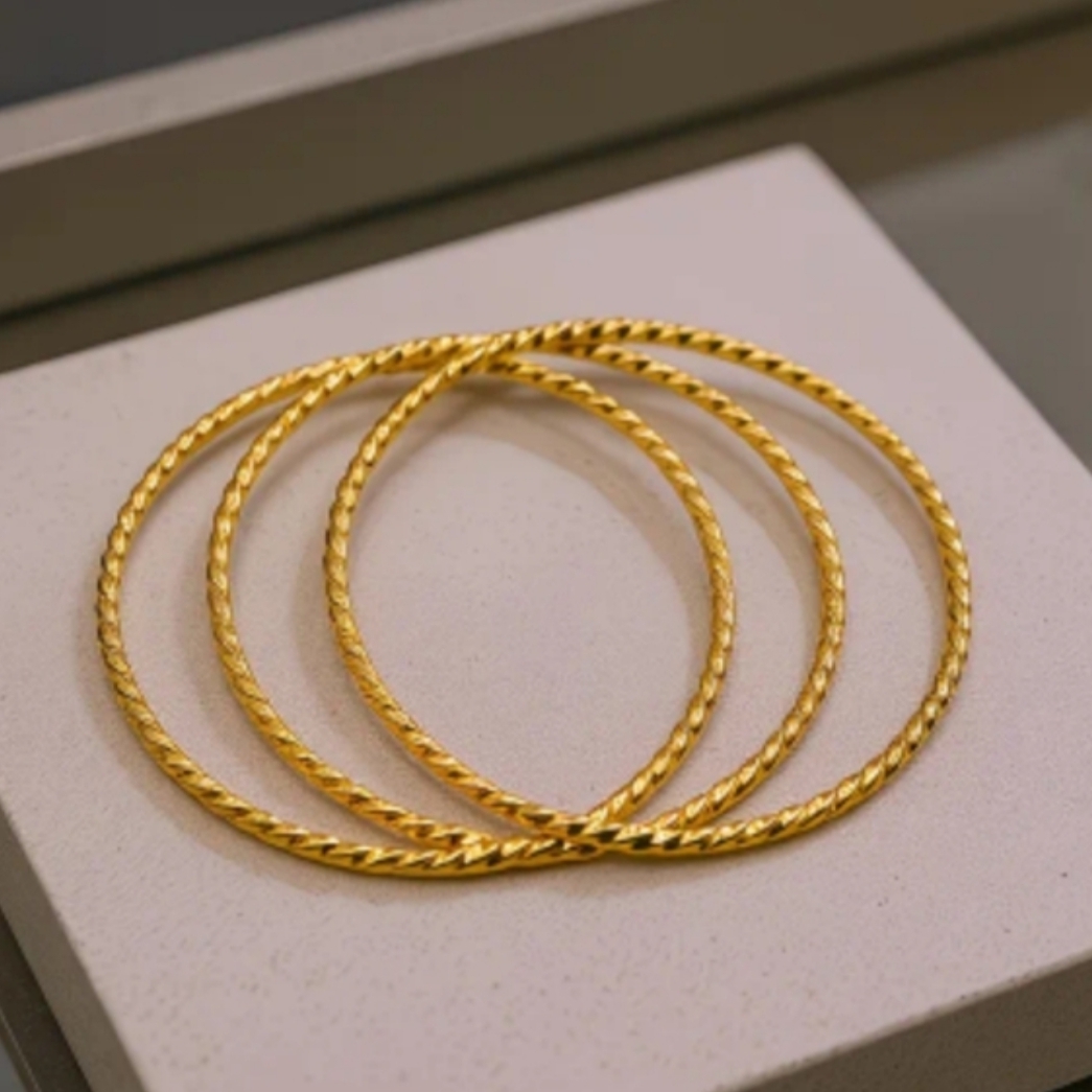 18 Kt Gold Over Titanium Bangles